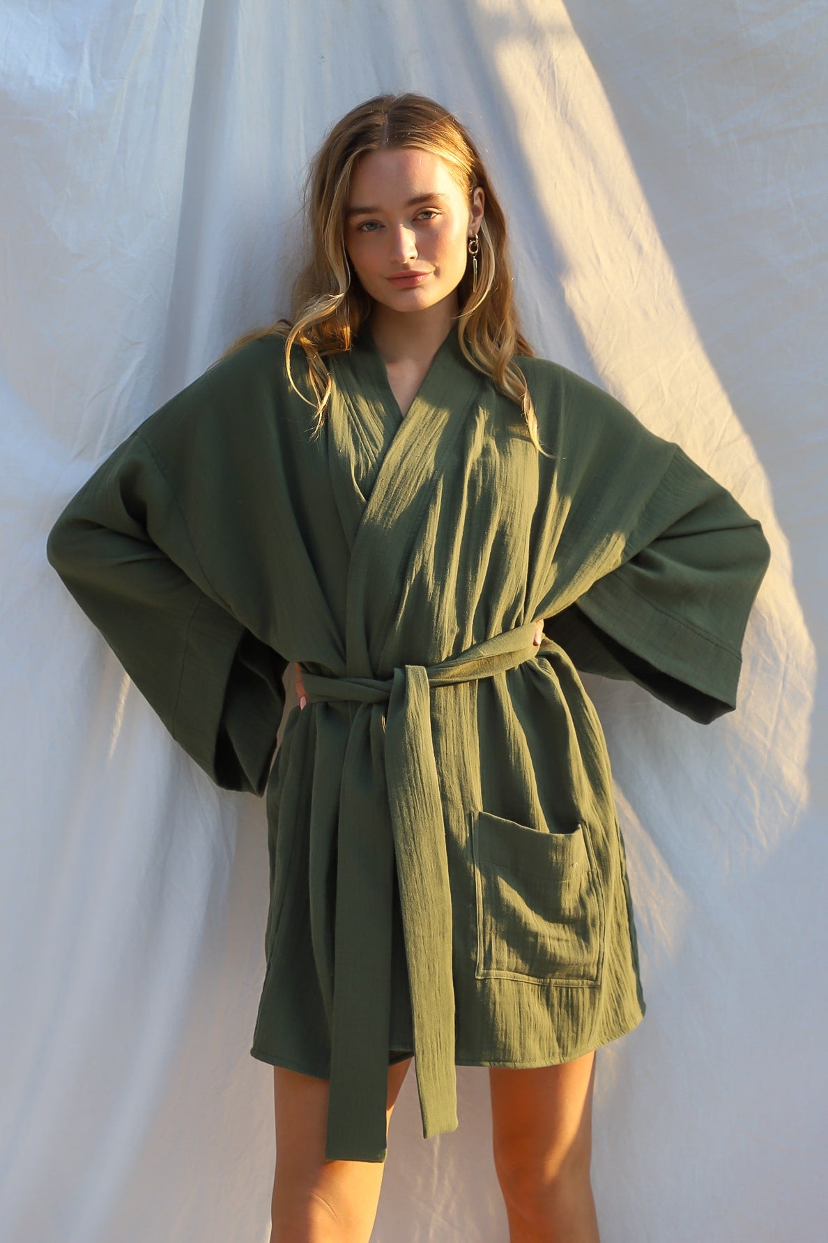 model wears kimono closed with included sash