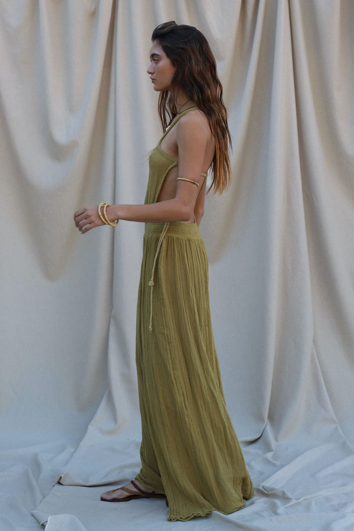 side shot of lumahai maxi dress in olive